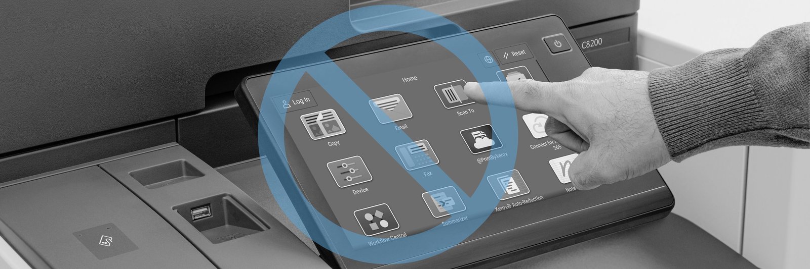 A person using a Xerox touchscreen with apps