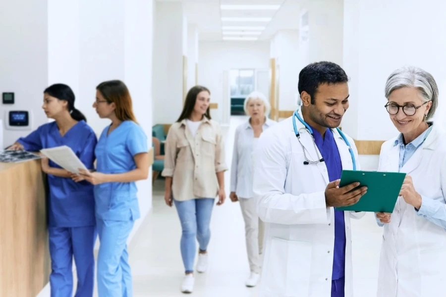 Healthcare professionals walking in a hospital hallway