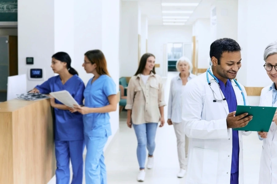 Healthcare professionals walking in a hospital hallway