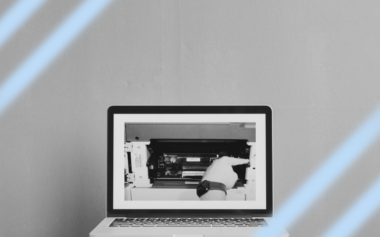 Macbook in black and white with blue.