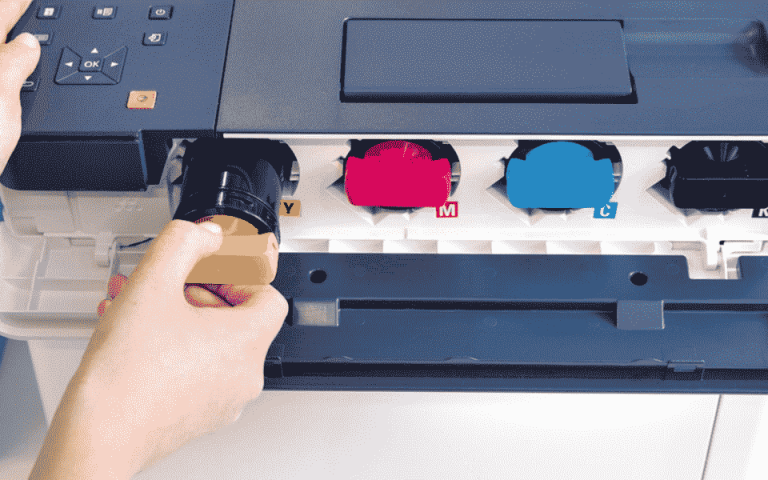Person changing a yellow toner cartridge