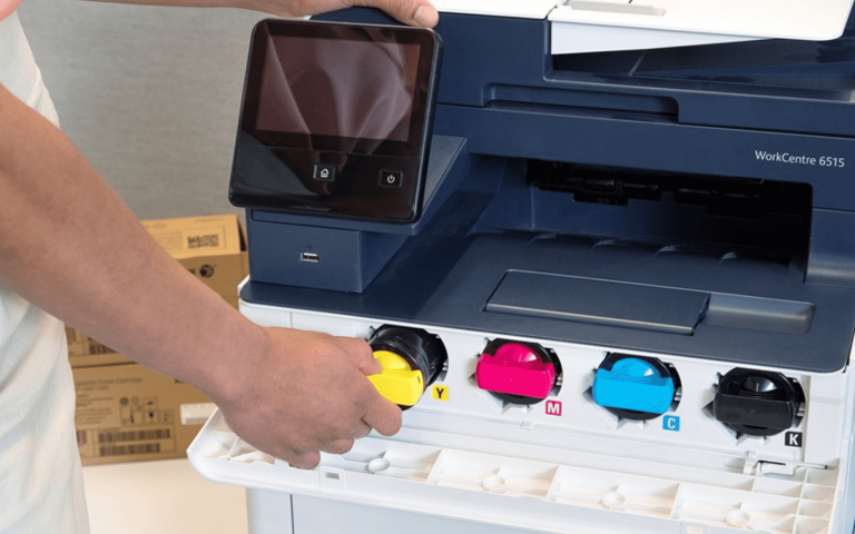 Person changing printer's toner