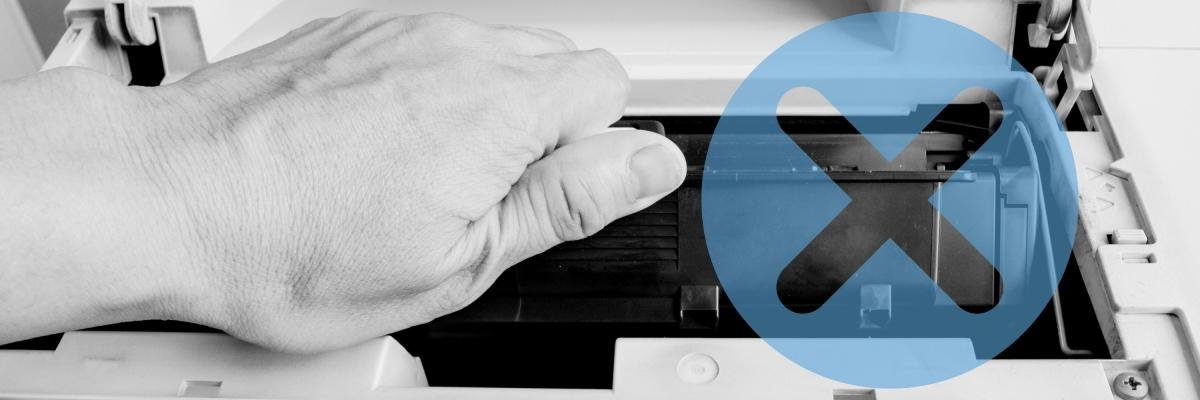 Printer technician replacing toner on a printer