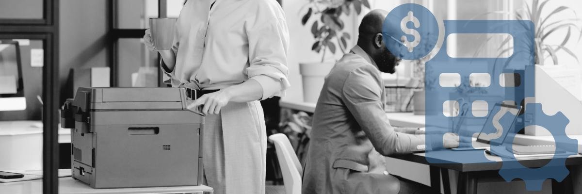 Woman and man in medium-sized office using printer and laptop