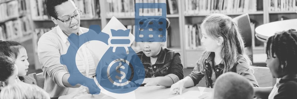 A teacher with students looking at paperwork