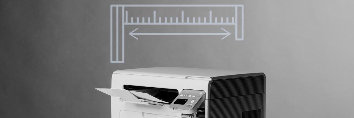 A printer with a graphic overlay of a measuring tape