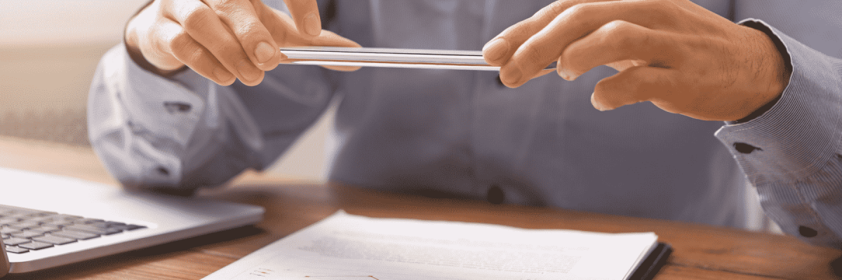 A person scanning a document with their phone