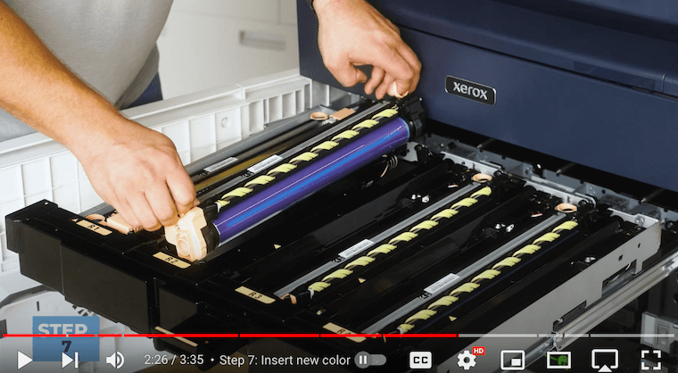 Printer technician inserts new color drum on the Xerox PrimeLink C9065